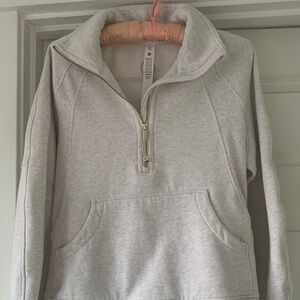 Lululemon women’s 1/4 zip sweatshirt, bone/gold accents.  SZ XS/S